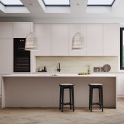 Creamy cabinetry bathed in natural lighting​